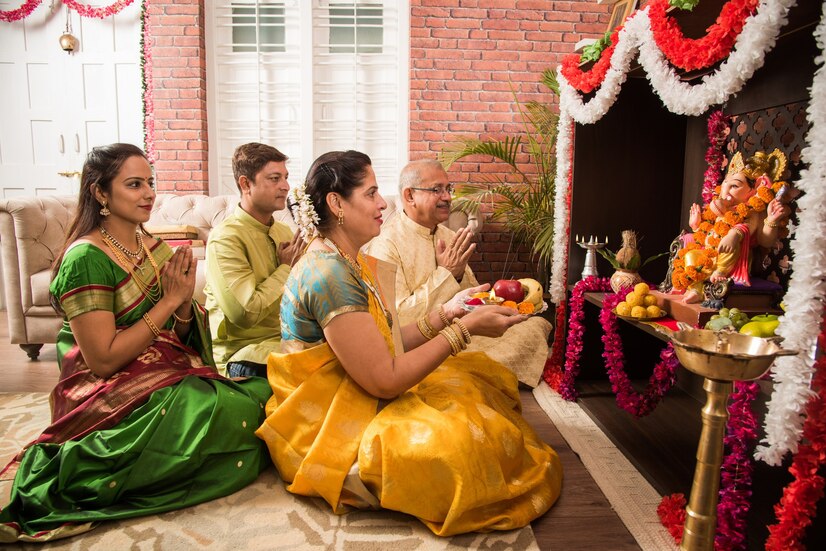 family doing pooja